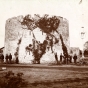 Black and white photograph of African American troops and officers of the Twenty-fifth Infantry standing by the Round Tower, c.1887.