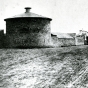 Black and white photograph of an exterior view of Fort Snelling showing the Round Tower, 1863.