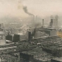 Black and white photograph of the the West Side Milling District of Minneapolis from the courthouse showing the extensive rail yards required for the shipping of grain and flour, ca. 1912. Photograph by Sweet.