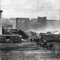 Black and white photograph of the ruins of the Pettit, Zenith, and Galaxy Mills after Washburn A Mill explosion on the Mississippi Riverfront, 1878.