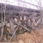 Minnesota and International Railway trestle bridge west side substructure and rail