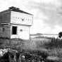Black and white photograph of the abandoned blockhouse at Fort Ripley, c.1895.