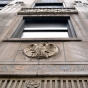 Color image of an eagle medallion and tile work above the main entrance of the Minnesota Building, 2009.