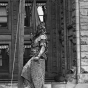 Black and white photograph of the statue of Germania being removed from the Germania Building, St. Paul, 1918.