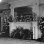 Black and white photograph of a drawing room decorated for Charlotte Hill's wedding to George T. Slade at the James J. Hill house, 240 Summit Avenue, St. Paul, 1901. Photographed by Charles A. Zimmerman.