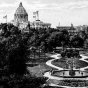 Tinted photographic postcard on paper. Its view faces northwest across Central Park toward the (then new) State Capitol, c.1915.