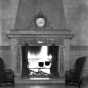 Black and white photograph of the baronial fireplace in the lobby of the St. Paul Athletic Club, c.1925.