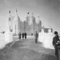 Black and white photograph of the 1937 Winter Carnival Ice Palace, looking west toward State Office Building.