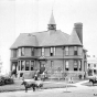 Back and white photograph of the exterior of Cottage Four at the State School, c.1900.