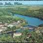 Color postcard showing an aerial view of Granite Falls, c.1965.