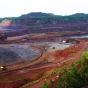 The Hull-Rust-Mahoning mine in Hibbing, Minnesota, is the largest open-pit iron mine in Minnesota. As of 2020, material is still mined from the complex by Hibbing Taconite, or HibTac. Photograph by Wikimedia Commons user Chipcity, August 7, 2010. CC BY-SA 3.0.