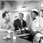 Reid Ray Film Industries films a scene for the movie <em> Cash on the Barrelhead</em> inside Mickey's Diner. Actor William Bendix is at center.