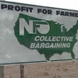 Color image of a National Farmers Organization sign on Highway 23, near St. Cloud. Photographed on January 24, 2016, by Therese Cain.