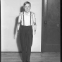 Black and white photograph of a boy with artificial arms, 1941. 