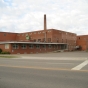 Color image of north and east façades, of Faribault Woolen Mill Company, 2011.