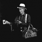 Man with vegetables grown from Northrup, King seeds