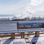 Northshore Mining, formerly Reserve Mining, is located in both Babbitt and Silver Bay.  The processing plant is located in Silver Bay. In this picture, the plant is visible along with a placard describing the taconite beneficiation process. Photo by Tony Webster, March 10, 2018. CC BY-SA 2.0.