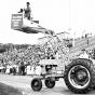 Black and white photograph of filming an Aquatennial event at Parade Stadium, August 10, 1956.