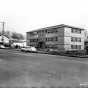 View of an apartment building at 2419 Plymouth Avenue in Near North Minneapolis. ca. 1957. Photo by Norton & Peel.