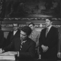 Governor Wendell Anderson signs a 1971 legislation package (the Minnesota Miracle) into law