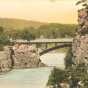 Colorized post card view of Old Man of the Dalles of the St. Croix and bridge over the river, 1920. 