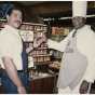 Oscar C. Howard (right) and a Byerly’s grocery store employee near a display of Chef Oscar’s BBQ Sauce, ca. 1980s. Oscar C. Howard papers, 1945–1990 (P1842), Cafeteria and Industrial Catering Business, 68601, Manuscripts Collection, Minnesota Historical Society, St. Paul.
