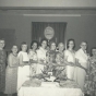 Black and white photograph of ten past BPWC presidents pose for a group photograph, 1961. From left to right: Gudvieg Norseth, Clara Berg, Belva Saugstad, Helen Espe, Clara Caouette, Frances Engebretson, Mae Rideout, Ruth Christenson, Ida Twedten, and Betty Ohman.