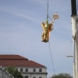 Color image of the figure of "Prosperity" being removed for restoration, September 23, 2014. Photographed by Linda A. Cameron.