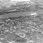 Black and white aerial view of West Side during flood, 1952.