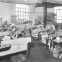 Black and white photograph of a work room, Minneapolis Artificial Limb Company, 1940.