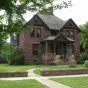 Color image of the Hinkly House, built in 1892 by R. B. Hinkly using Sioux quartzite mined from a quarry where the Blue Mounds State Park is located, 2007. 