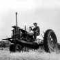 Black and white photograph of a Farmall tractor on the farm of Mike O'Boyle, St. Paul Park, 1938.