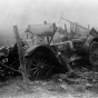 Black and white photograph of the ruins of a car after fire, Kettle River Road, 1918. 