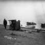 Black and white photograph of automobiles in Moose Lake after fire, 1918. 