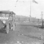 Black and white photograph of Red Cross Motor Service car providing relief efforts after the October fires of 1918. 