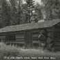 Black and white photograph of a cbin in Itasca State Park built by the Civilian Conservation Corps, ca. 1940.