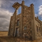 Color image of the front side of the exterior of Schott Barn. Photographed on April 14, 2014, by Craig Voth.