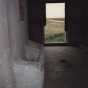 Color image of a trough inside Schott Barn, c.1985.