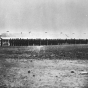 Second Minnesota Volunteer Infantry standing in front of the Long Barracks