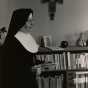 Black and white photograph of Alice Gustava Smith (Sister Maris Stella) in her office at the College of St. Catherine, c.1970. 