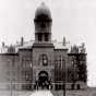 Black and white photograph of the Murray County Courthouse in Slayton, ca. 1892.