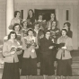 Black and white photograph of Holiday carolers at St. Joseph’s Academy, c.1950. 