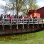 Color image of a tour group at End-O-Line Railroad Park in Currie, May 2014.