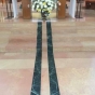 Floor decoration honoring Father Michael J. Casey