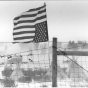  Upside-down American flag flying at Wounded Knee