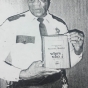 Photograph of John Lyght receiving an award