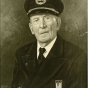 Albert Woolson in his Grand Army of the Republic uniform. The plaque reads, “Albert Woolson, Born February 11, 1847 [sic], Presented by the Children of the Duluth Public Schools in 1952 on the Occasion of his 105th [sic] Birthday.” Photograph by Basgen-Presley, Duluth.