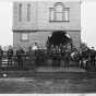 The Hinckley fire house, firemen, and Waterous steam fire engine, before September 1, 1894. The steam fire engine was manufactured in South St. Paul. 