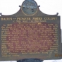 Photograph of highway waymarker for Badus Colony