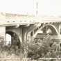 Black and white postcard image of the concrete Anoka–Champlin Mississippi River Bridge, ca. 1929. 